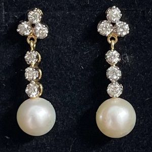 Amazing earrings.14k natural Diamonds and real pearl.